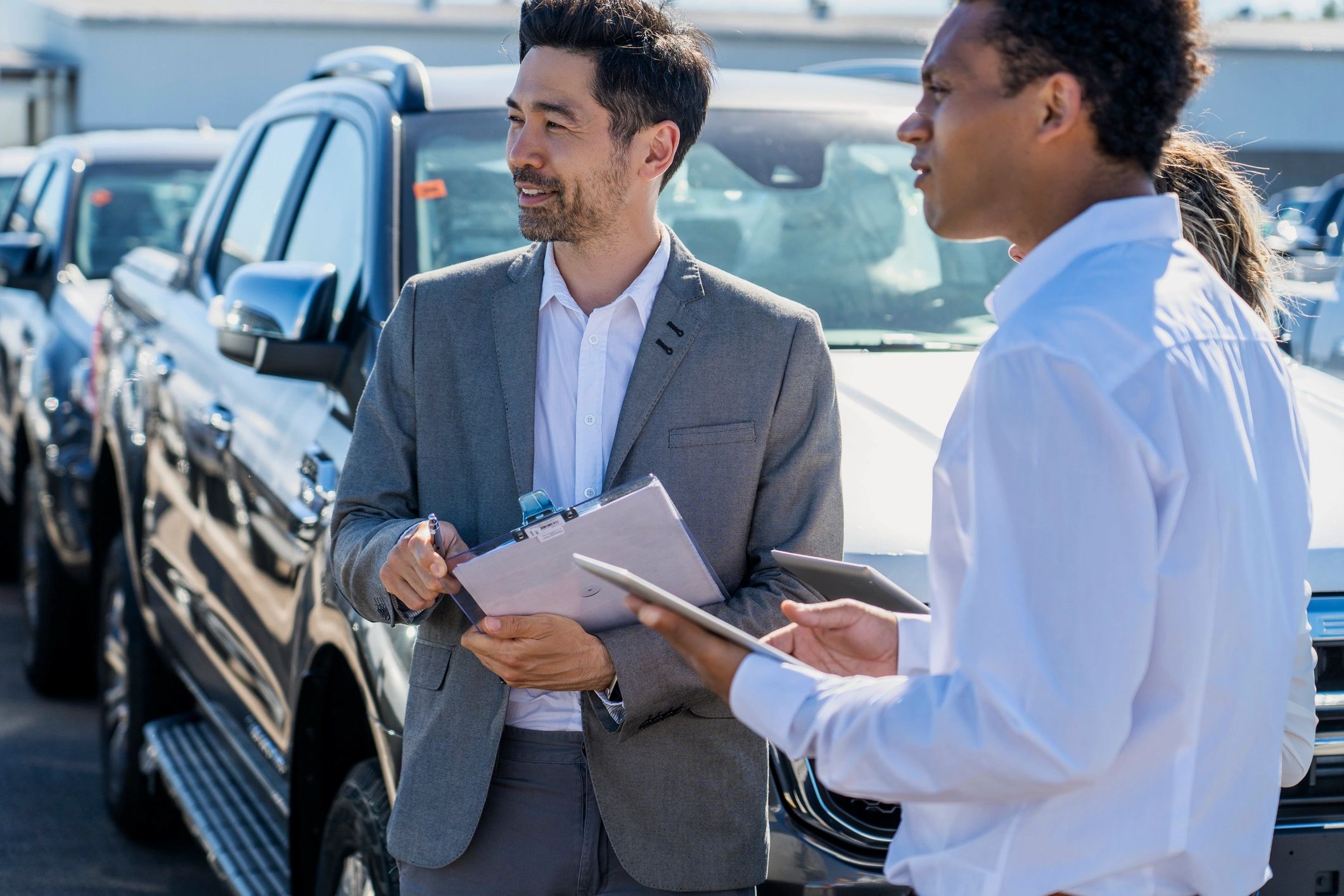 Professional parking staff coordinating service outdoors