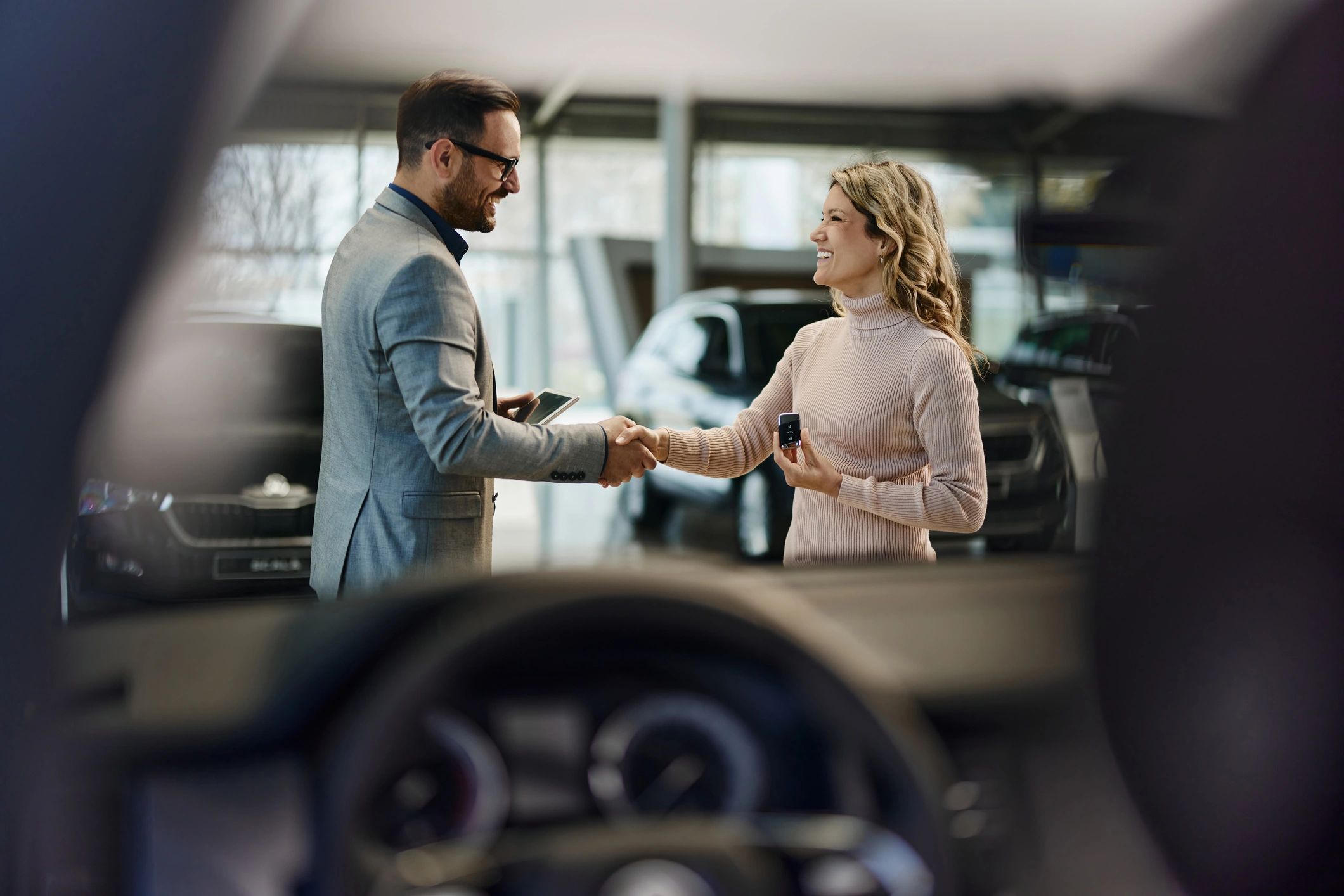 Attendant assisting with a premium vehicle handoff